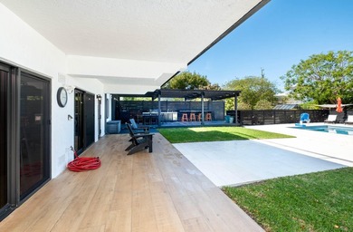 Beautifully remodeled 1998 concrete home is situated on a - photo 12