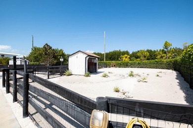 Beautifully remodeled 1998 concrete home is situated on a - photo 13