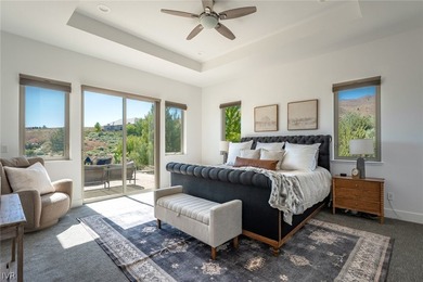 Set within the gated Champion Hills enclave of Somersett beneath - photo 13