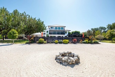 Beautifully remodeled 1998 concrete home is situated on a - photo 15