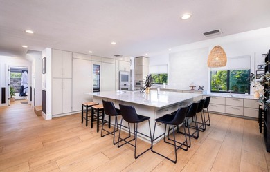Beautifully remodeled 1998 concrete home is situated on a - photo 20