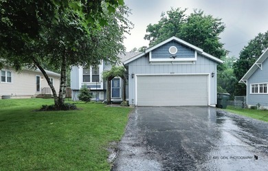Welcome home to this beautifully updated and meticulously - photo 1
