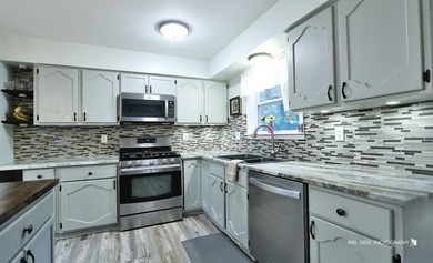 Welcome home to this beautifully updated and meticulously - photo 7