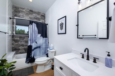 Beautifully remodeled 1998 concrete home is situated on a - photo 31