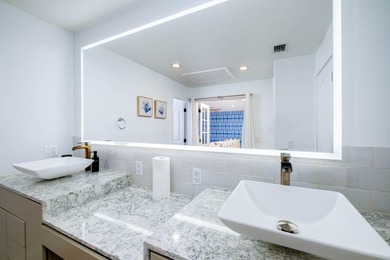 Beautifully remodeled 1998 concrete home is situated on a - photo 35