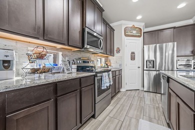 Thoughtfully designed and impeccably maintained, this 4-bedroom - photo 12