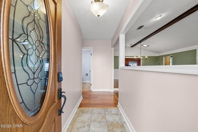Welcome home to your updated, brick residence nestled in one of - photo 4
