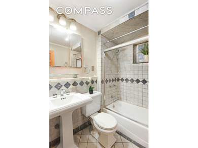 Discover the timeless appeal of this elegant, fully-brick - photo 10