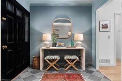 Stunningly renovated in 2024, this 4-bedroom, 3 full bath and 1 - photo 3