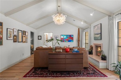 Stunningly renovated in 2024, this 4-bedroom, 3 full bath and 1 - photo 6