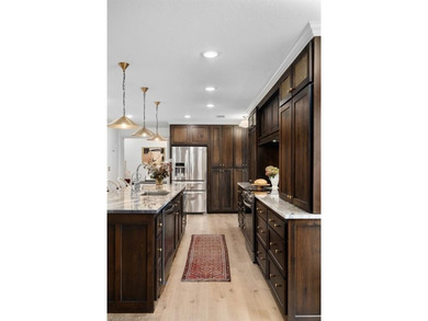 Stunningly renovated in 2024, this 4-bedroom, 3 full bath and 1 - photo 10