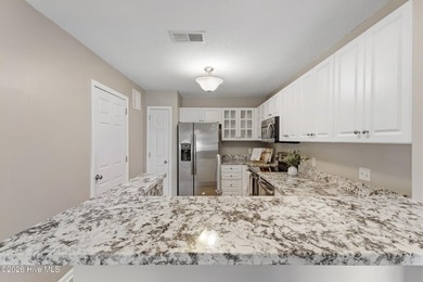 Welcome to this peaceful waterfront condo located on the second - photo 8