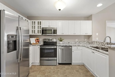 Welcome to this peaceful waterfront condo located on the second - photo 9