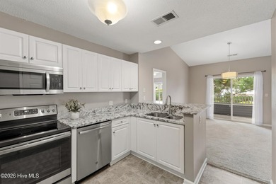 Welcome to this peaceful waterfront condo located on the second - photo 10