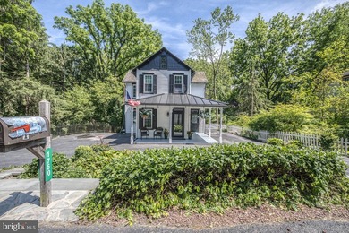 Charming farmhouse-style home nestled on a beautifully - photo 3