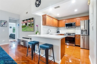 Lake Condo For Sale in Deerfield Beach, Florida