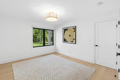 Secluded and serene on 1.1 lush acres in Water Mill, this - photo 11