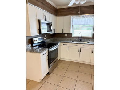 Welcome to 1708 E Main Street, Lakeland, FL! This beautifully - photo 12