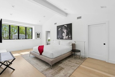 Secluded and serene on 1.1 lush acres in Water Mill, this - photo 12
