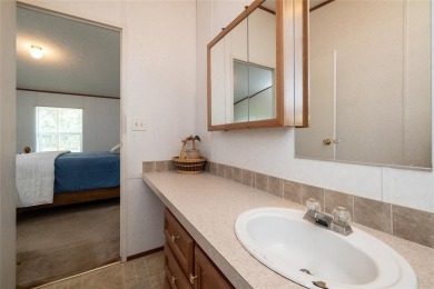 Welcome to 207 Lazy B Lane in Springtown TX. This well laid