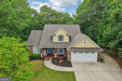 Lake Lanier convenience without the high price tag! Nestled on a - photo 1