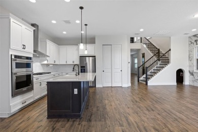 Welcome to the pinnacle of refined living in the exclusive gated - photo 11
