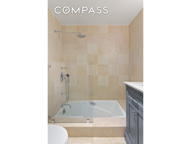 Discover a serene living experience at 8 W 65th St #4B, a - photo 11