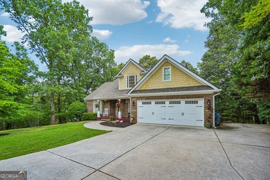 Lake Lanier convenience without the high price tag! Nestled on a - photo 2
