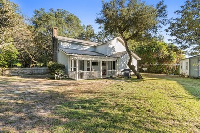 Welcome to 517 Main Street, a charming two-story home tucked - photo 2