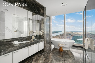 *The Apex Duplex, occupying the 127th and 128th floors, is a - photo 14
