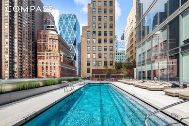 *The Apex Duplex, occupying the 127th and 128th floors, is a - photo 23