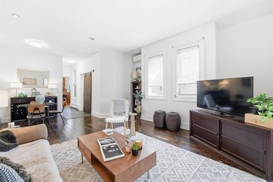 Spacious and bright uptown 2-bedroom, 1-bath home featuring high - photo 3