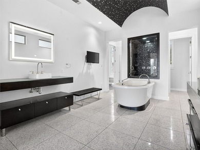 Experience elevated living in the prestigious gated community of - photo 12