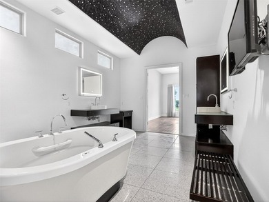 Experience elevated living in the prestigious gated community of - photo 13