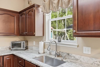 This stunning two-story single-family home is nestled in the - photo 14