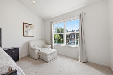 This stunning two-story single-family home is nestled in the - photo 30