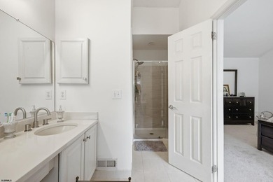 This stunning two-story single-family home is nestled in the - photo 35