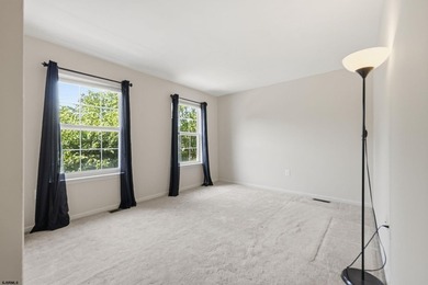 This stunning two-story single-family home is nestled in the - photo 41
