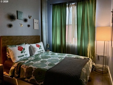 Experience elevated urban living in this refined corner unit