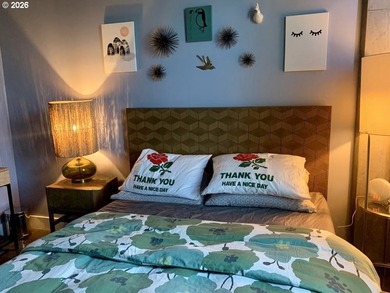 Experience elevated urban living in this refined corner unit