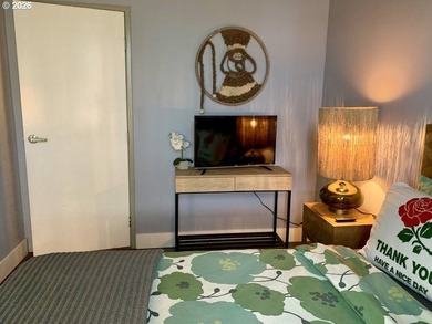 Experience elevated urban living in this refined corner unit