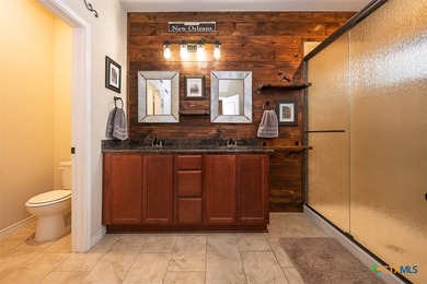 Set in a lake-adjacent neighborhood that keeps you close to the - photo 14