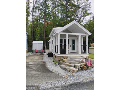 Welcome to the upgraded *Seashore* Tiny Home, a beautifully - photo 1