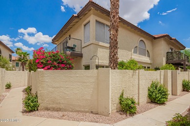 This beautifully updated two-story townhome in Ahwatukee is