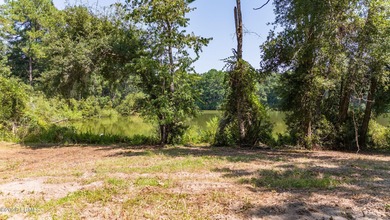 Discover the beauty and tranquility of this 6+ acre lot on - photo 3