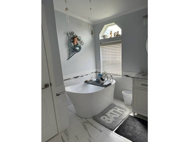 Step into easy Florida living with this beautifully updated - photo 8