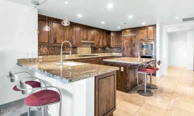 This stunning luxury condominium in the highly coveted