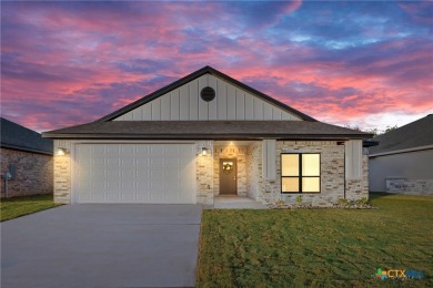 Welcome to this stunning 4-bedroom, 3-bathroom custom home