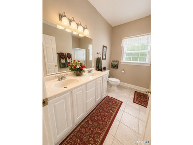 Situated on over an acre of manicured grounds, this custom-built - photo 16
