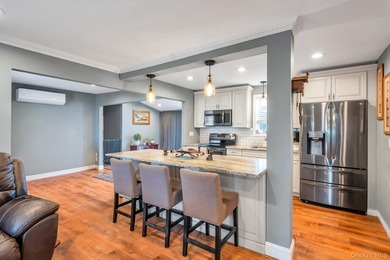 Welcome to 76 Huntington Drive, a beautifully updated 3-bedroom - photo 8
